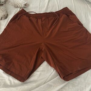 Lululemon 9” linerless shorts orange.  Size XL.